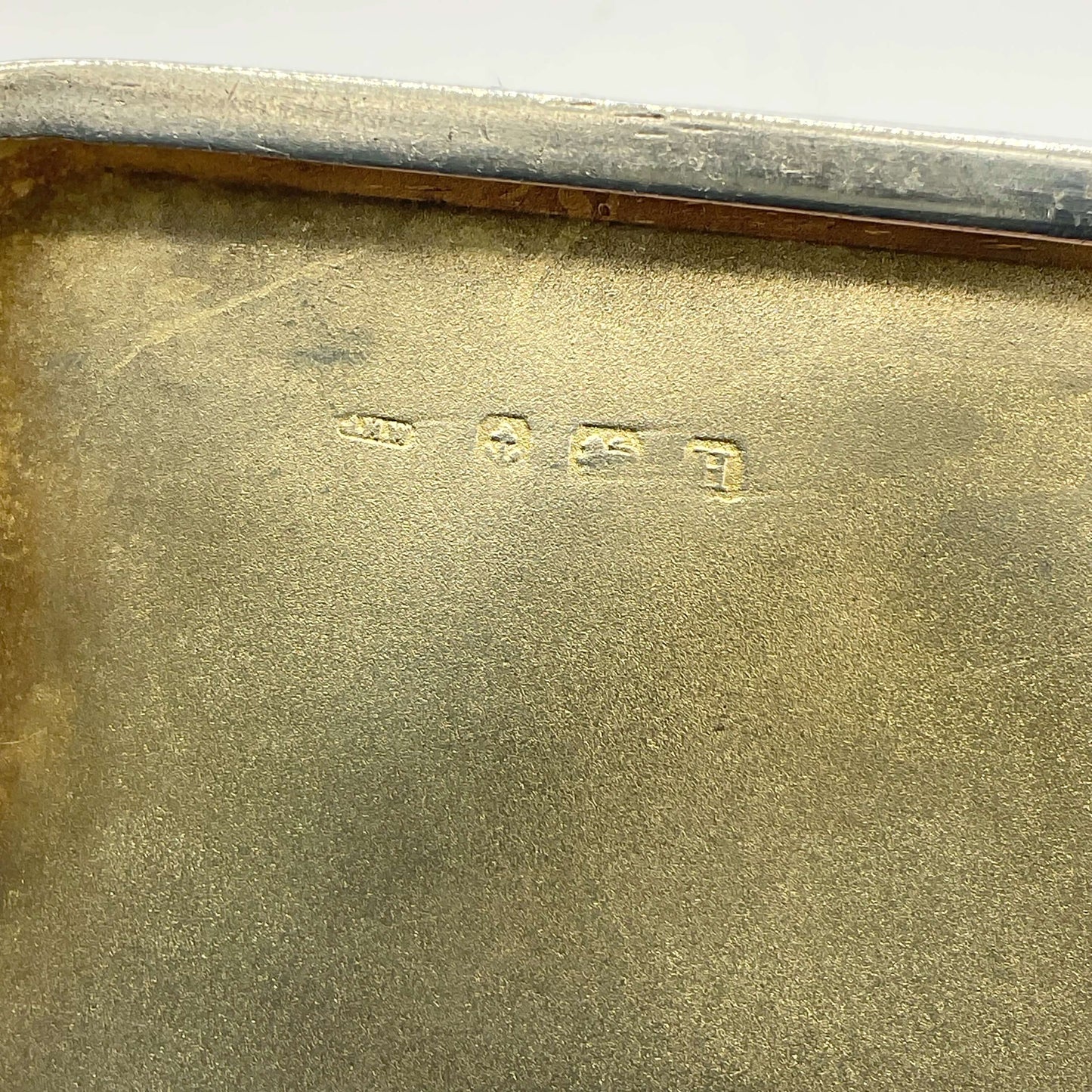 JHW makers mark and Birmingham 1932 hallmarks on inside of case