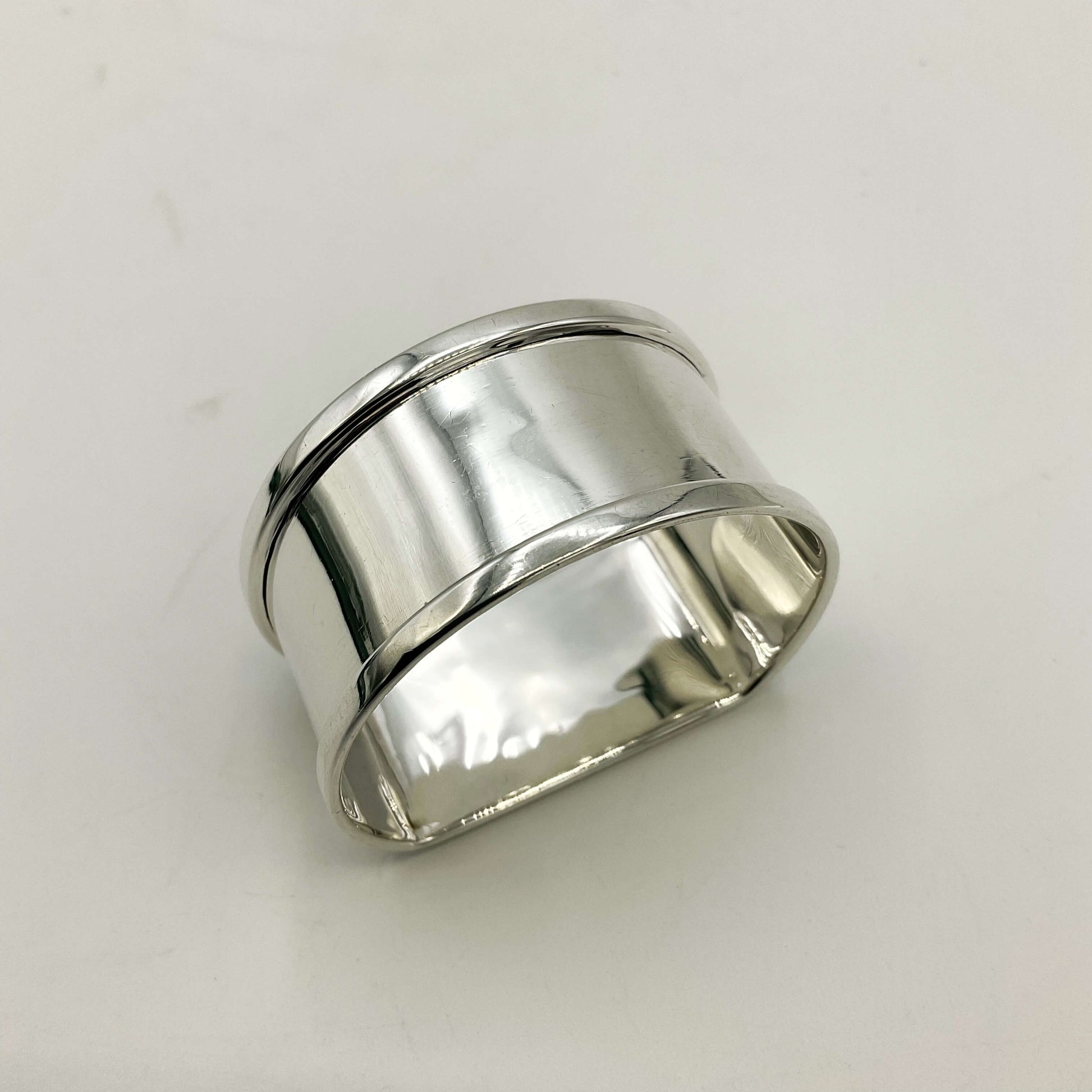 Vintage Silver napkin ring on a white background 