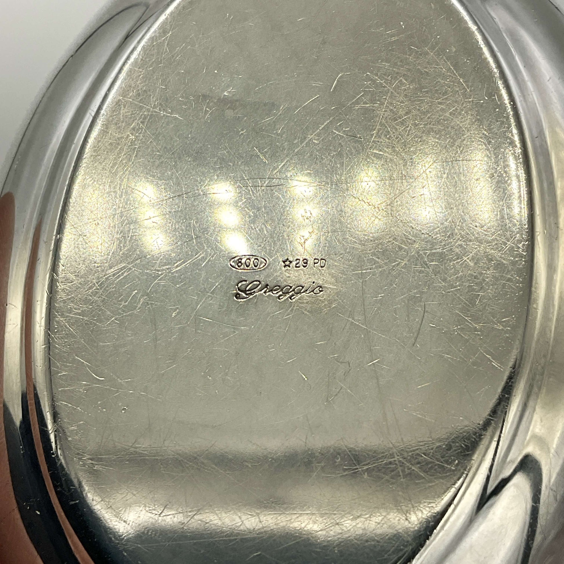 Base of silver trinket box showing maker as Greggio and Italian hallmarks