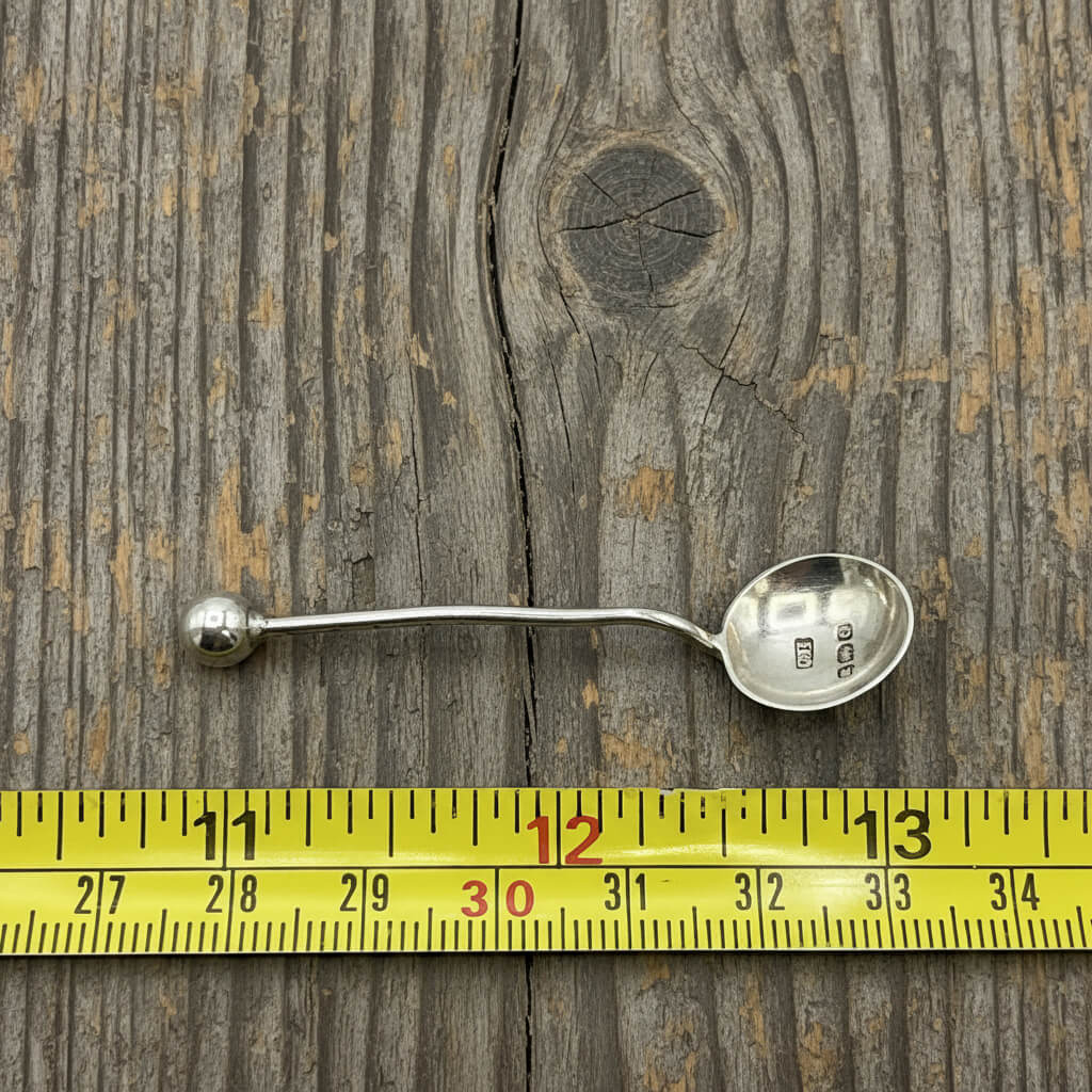 Antique 1902 small sterling silver salt spoon by Beeches Vintage, featuring intricate design and polished finish.