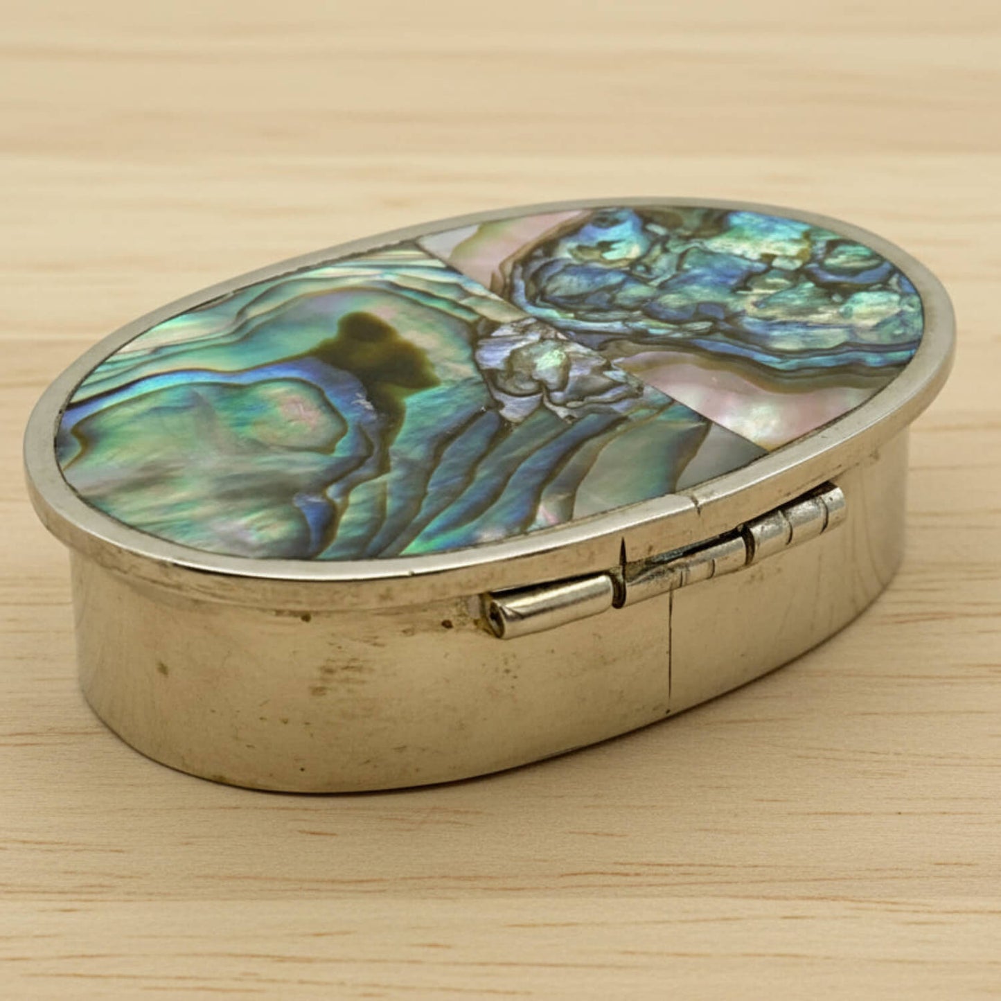Mexican Abalone Shell Pill Box back view on wood table