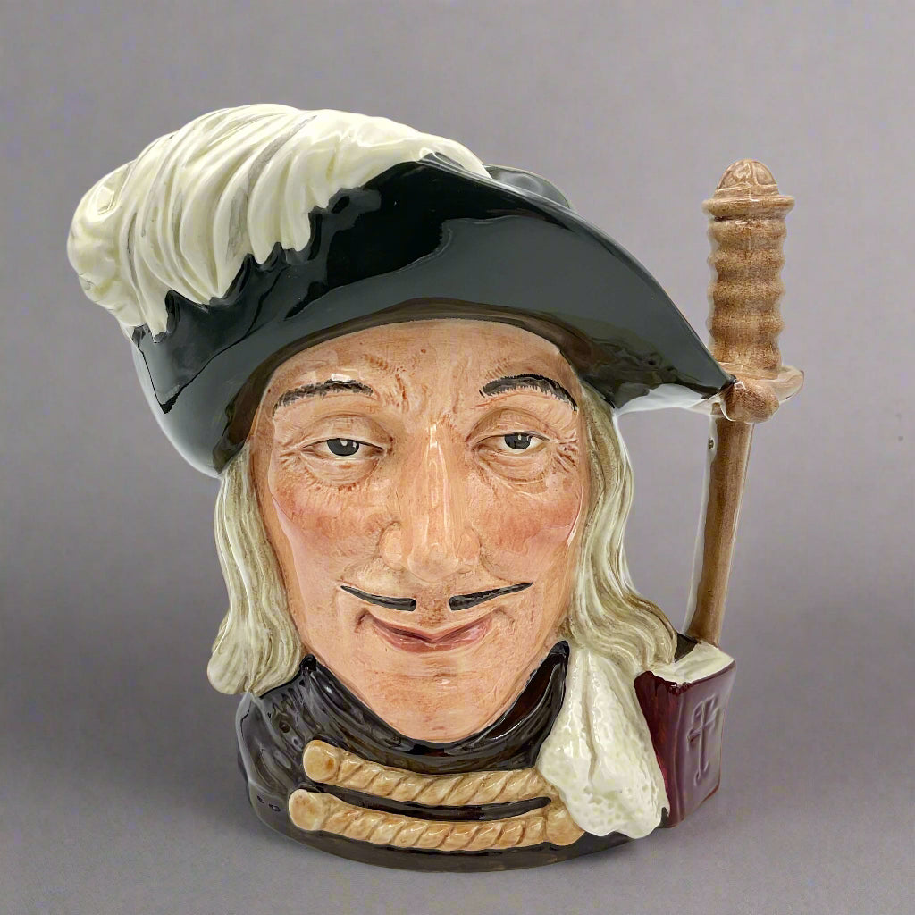 Large Aramis toby jug on plain background.