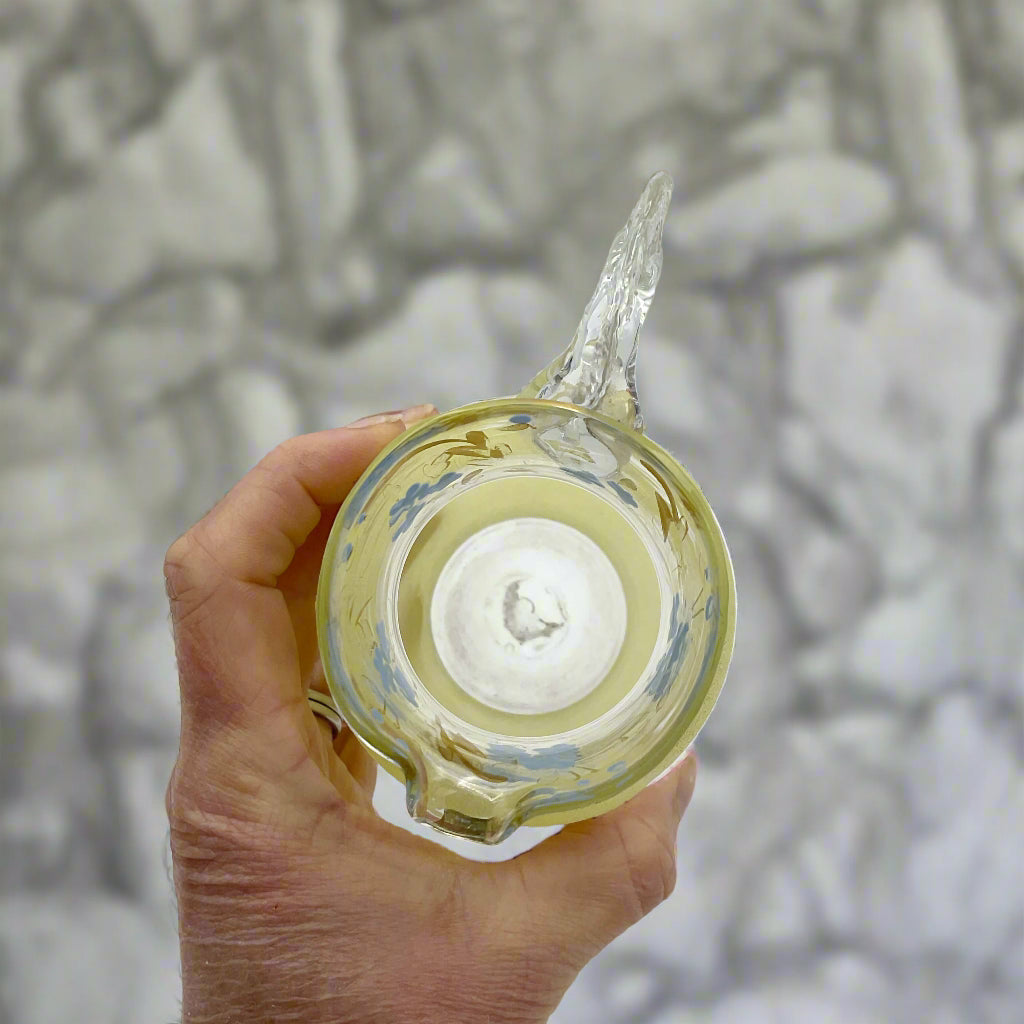 Small_Vintage_1950s_Glass_Jug_300ml base held in a hand with a marble background