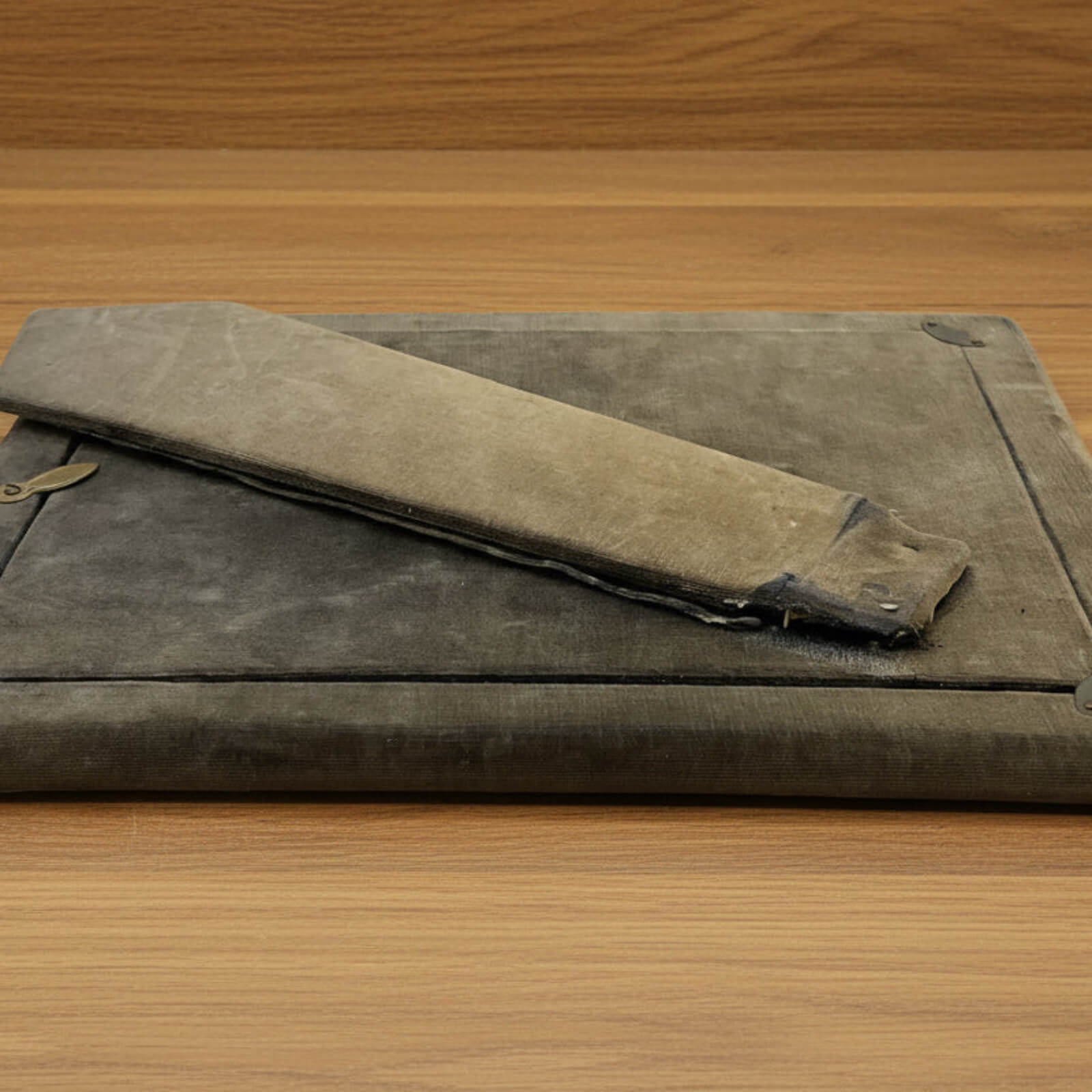 back of photo frame on a wood surface