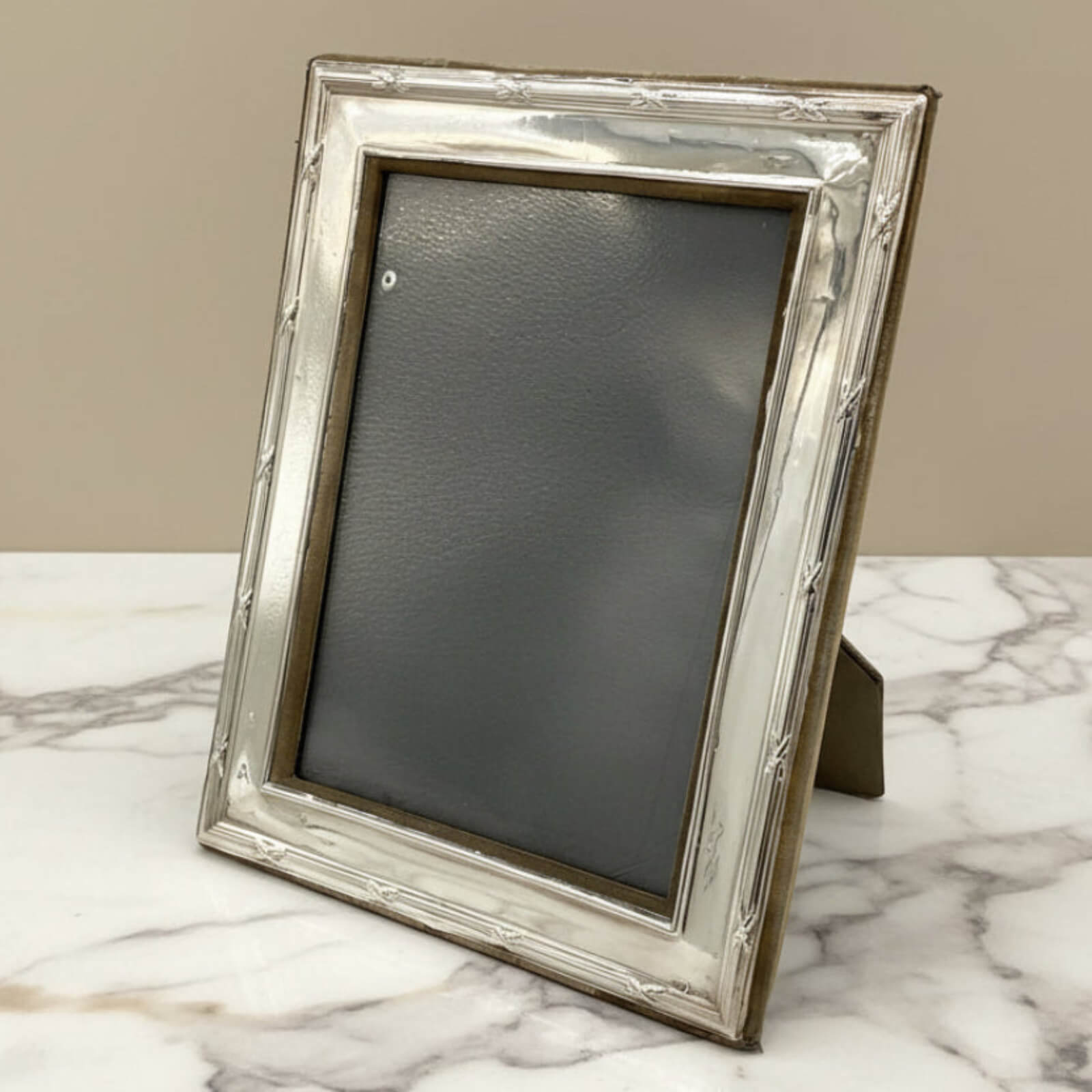 Sterling Silver Rectangular Photo Frame on a marble surface