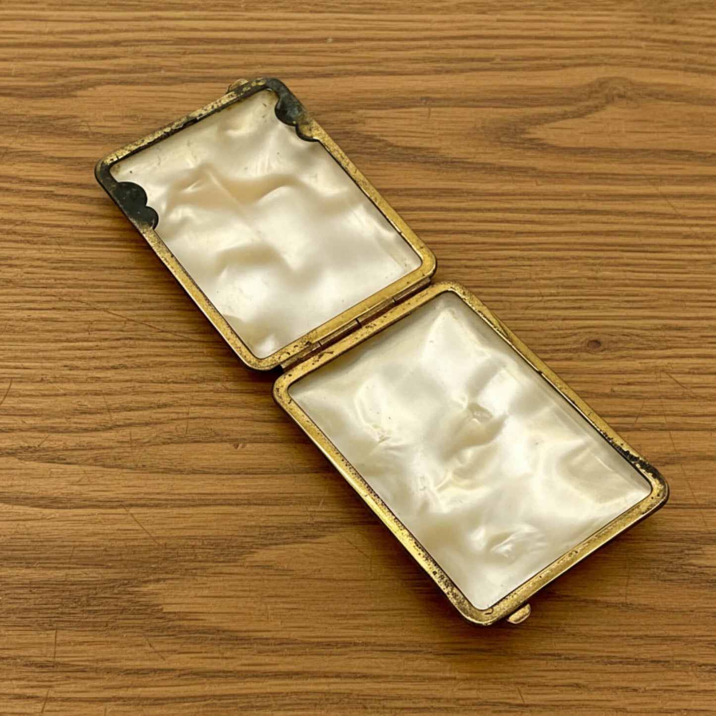 Open case on a wooden surface
