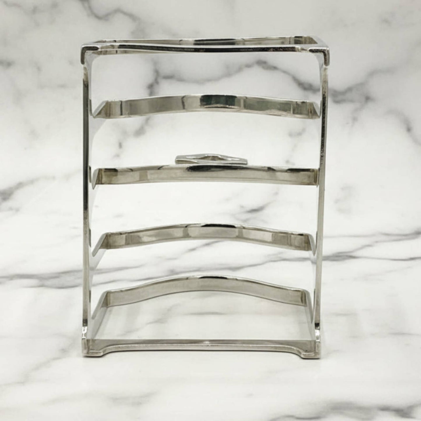 Silver toast rack on a marble background