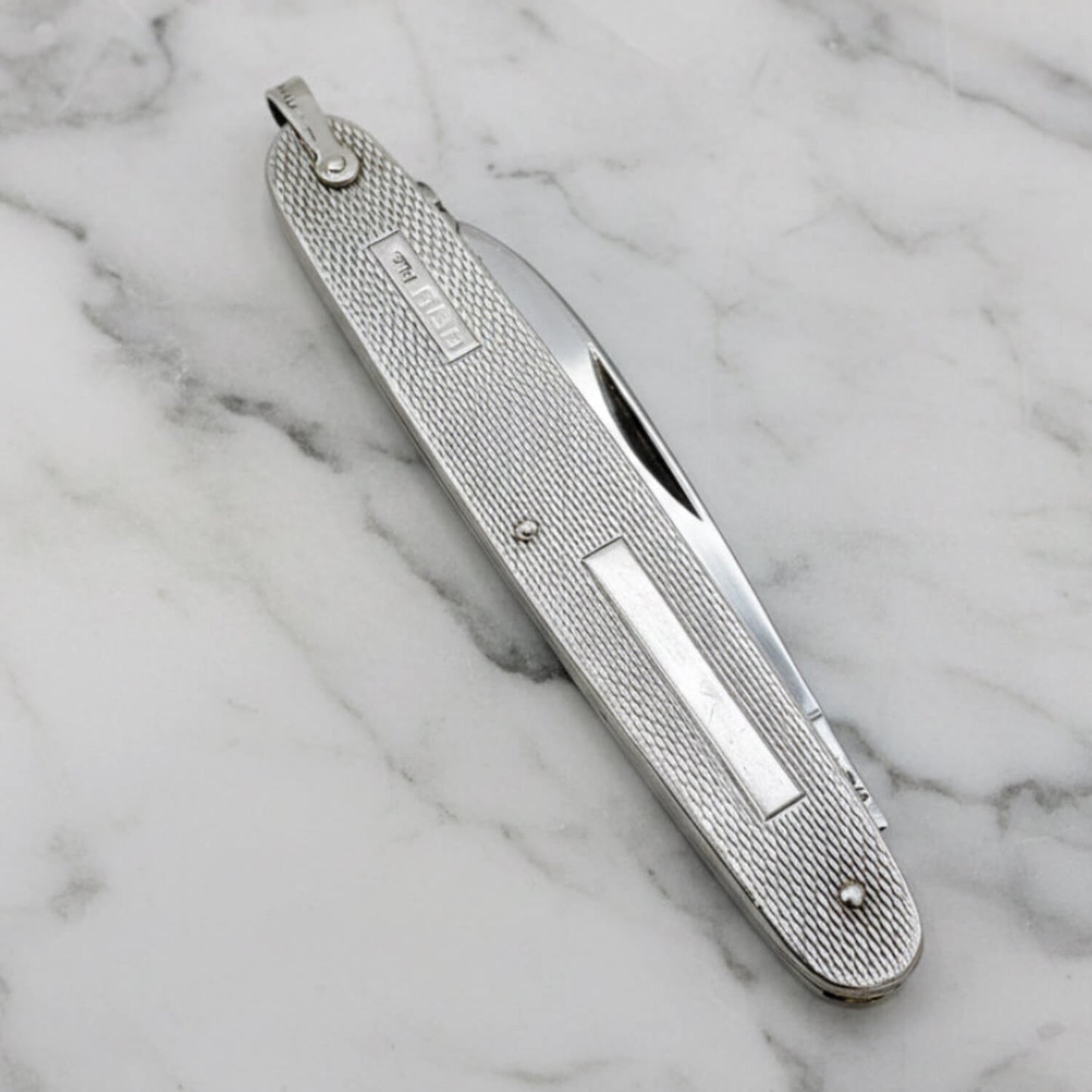 Vintage Sterling Silver Pen Knife on a marble worktop