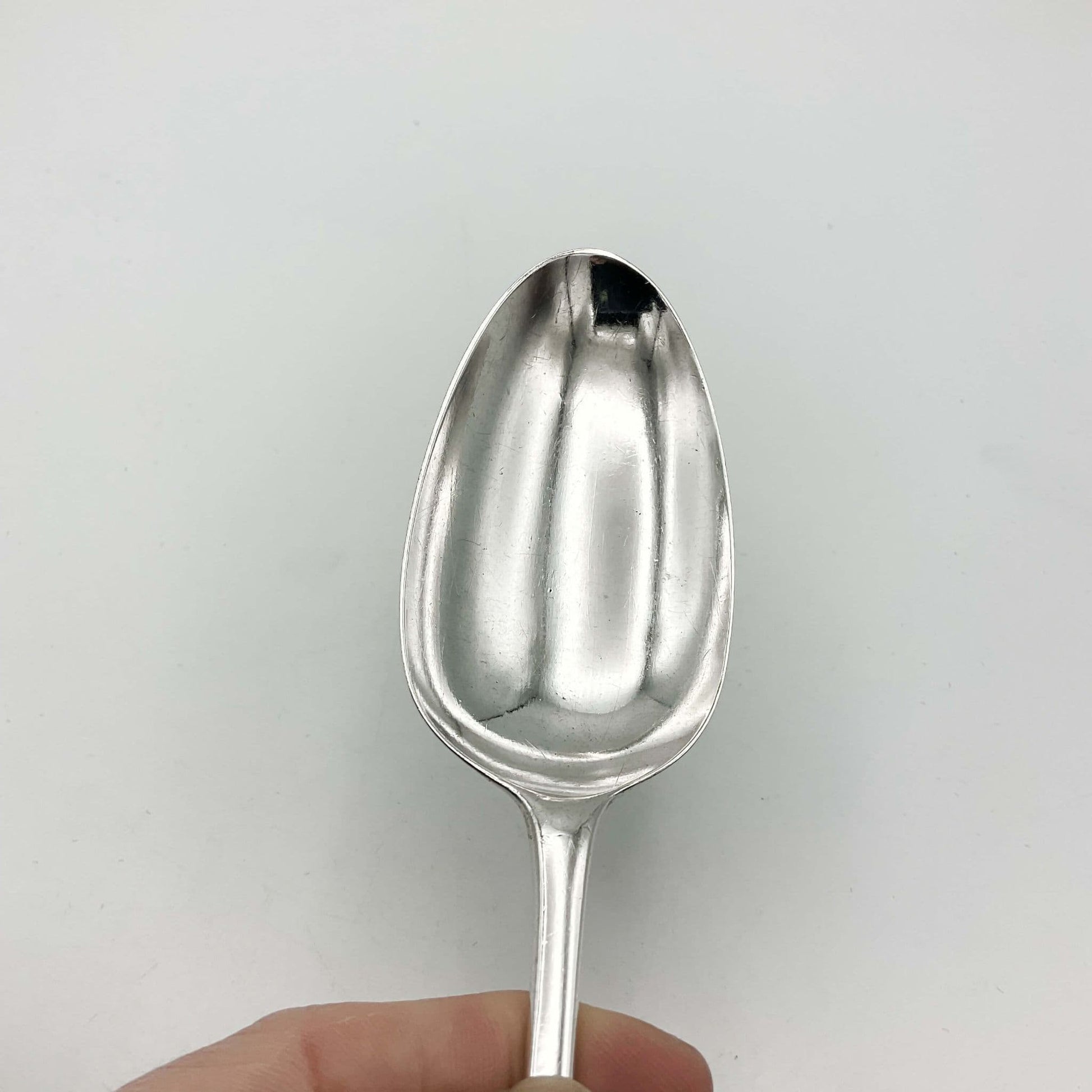 bowl od antique silver serving spoon