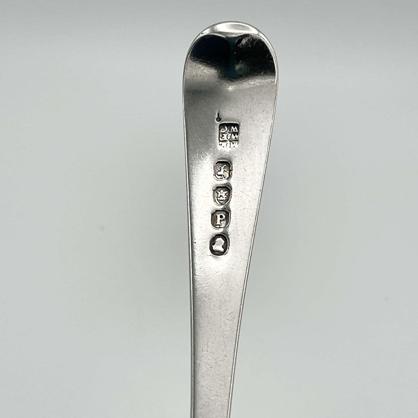 Georgian silver hallmarks for 1810 at top of handle