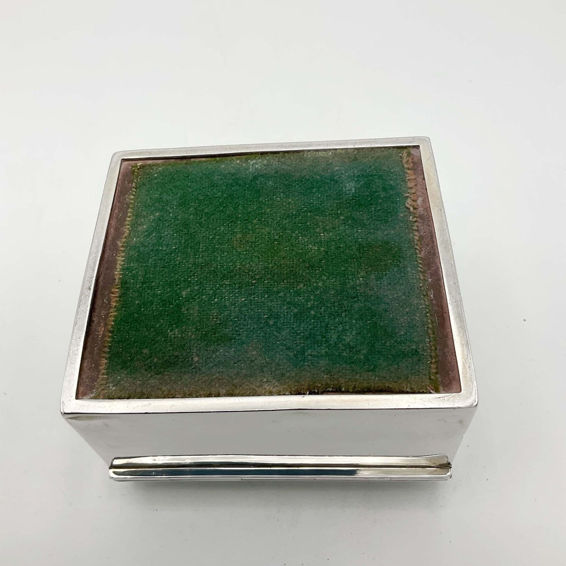 Base of Antique Edwardian Silver Cigarette Box showing green felt
