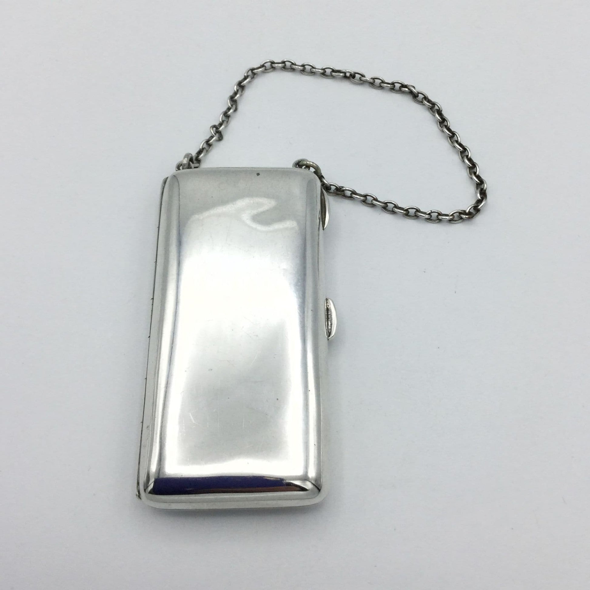 Shiny Silver case with chatelaine chain on white background