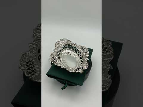 Video short of ornate antique silver bowl on turntable 
