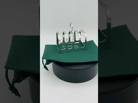 Video short of Antique Art Deco Silver toast rack on a turntable 