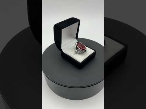 Video short showing Beautiful orange Carnelian gemstone silver ring in presentation box on a turntable 