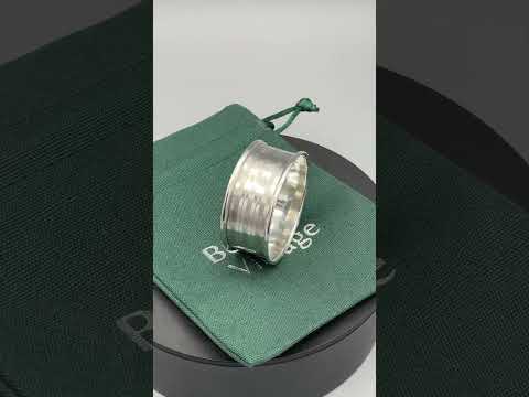 Video short of Antique Silver napkin ring on a turntable