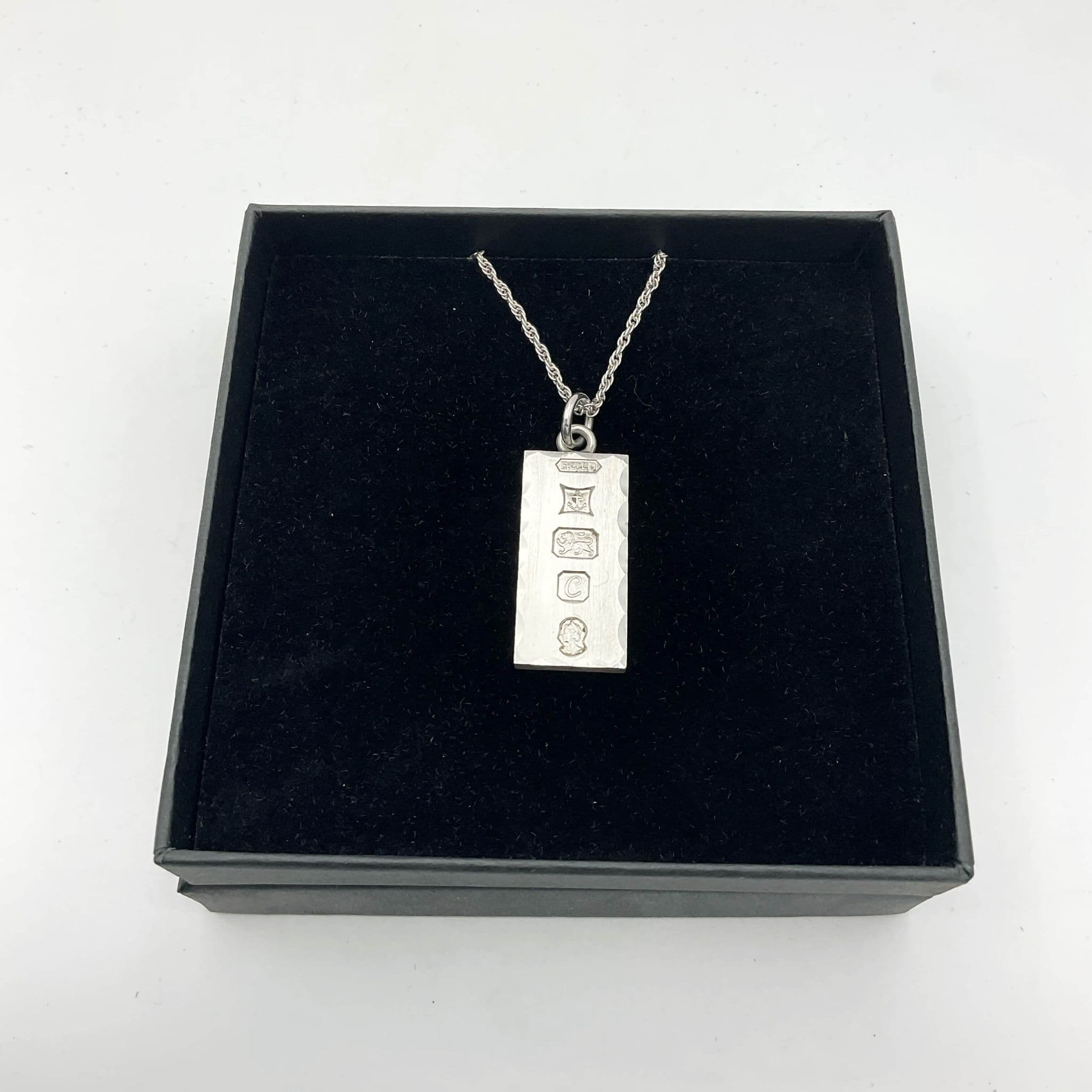 Silver ingot deals pendant 1977