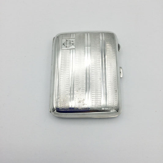 beautiful art deco silver cigarette case on a white background