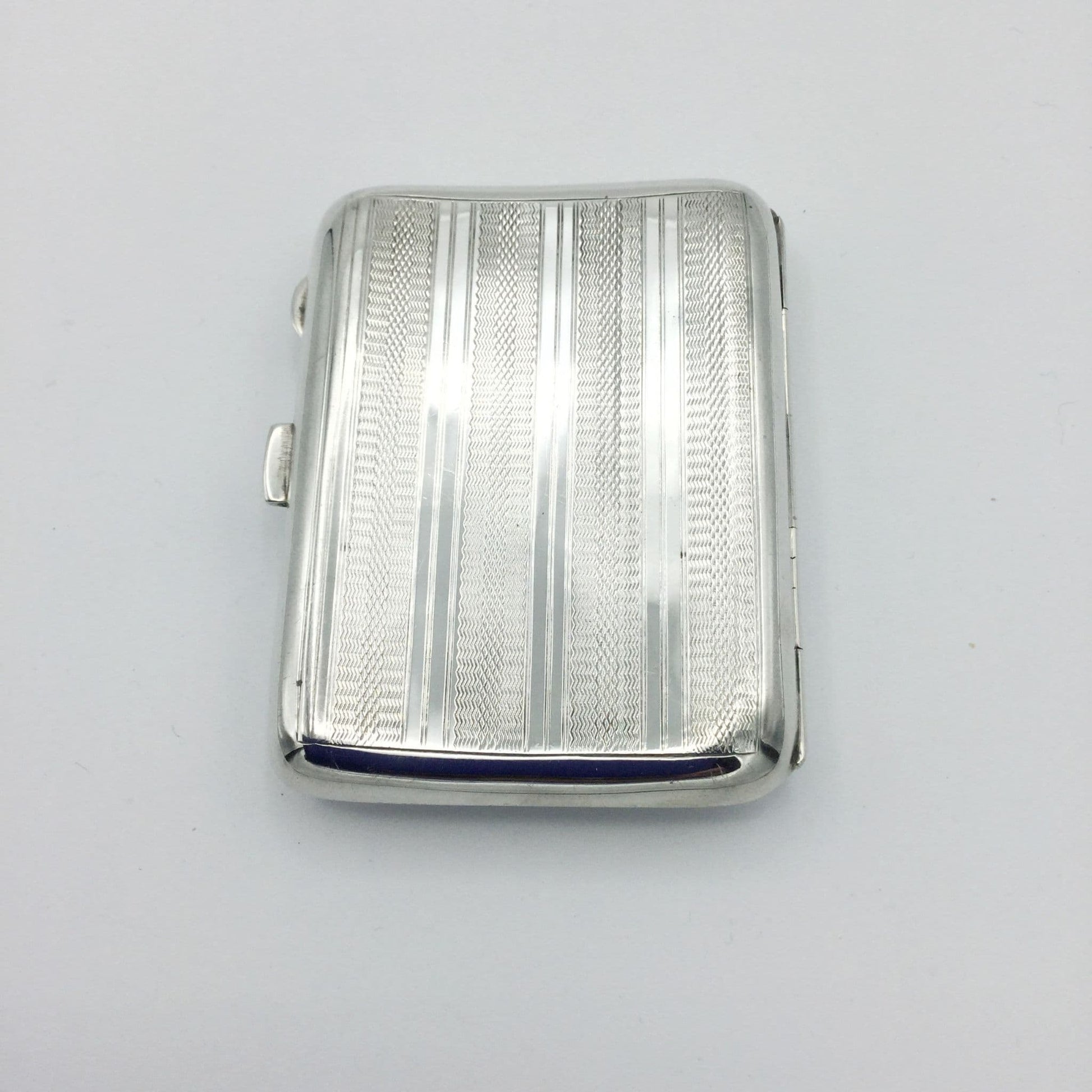 back of art deco silver cigarette case