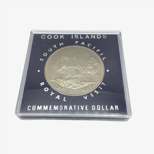 Cook Islands dollar coin with a ship on it in a blue case
