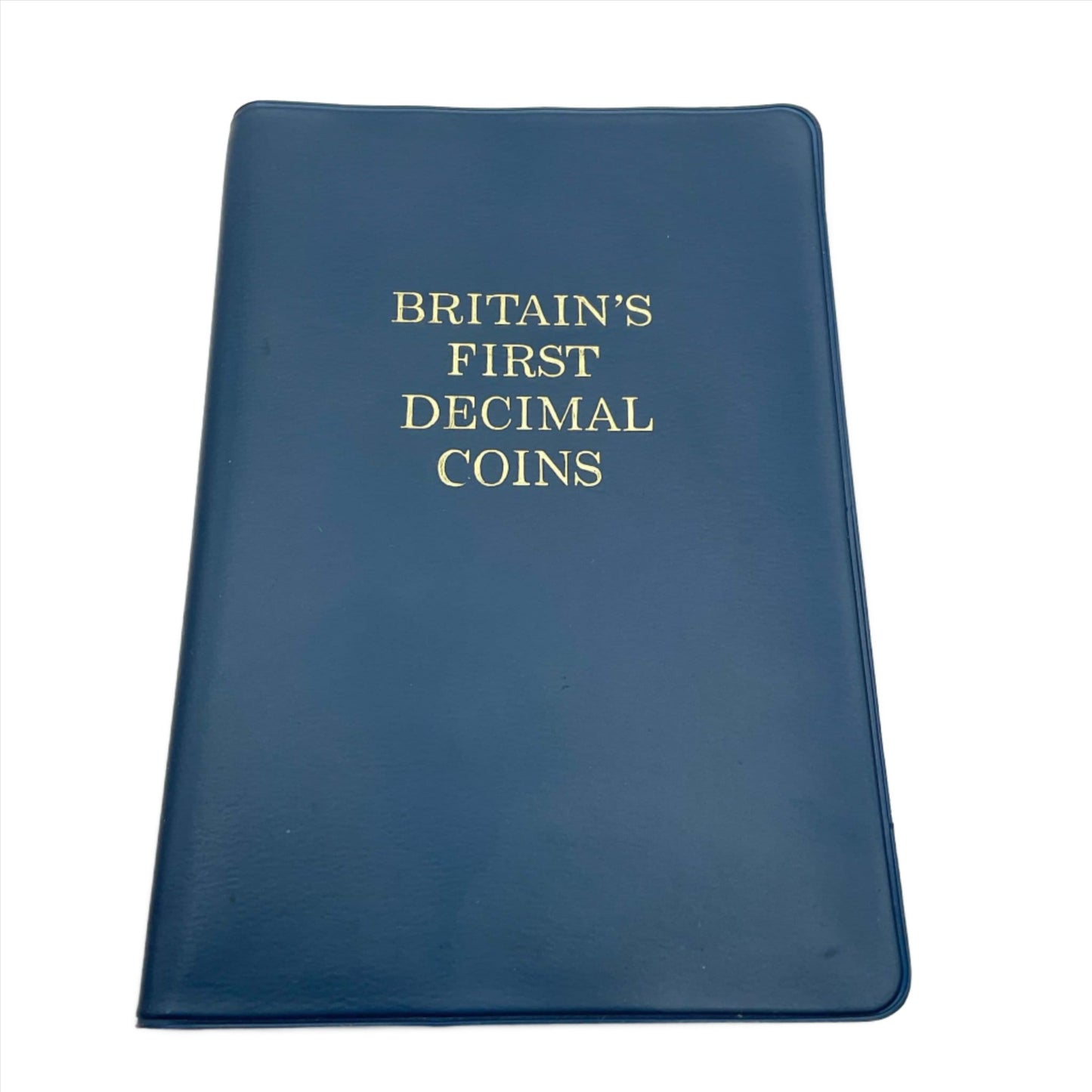 Blue folder with Britain's First Decimal Coins written on it