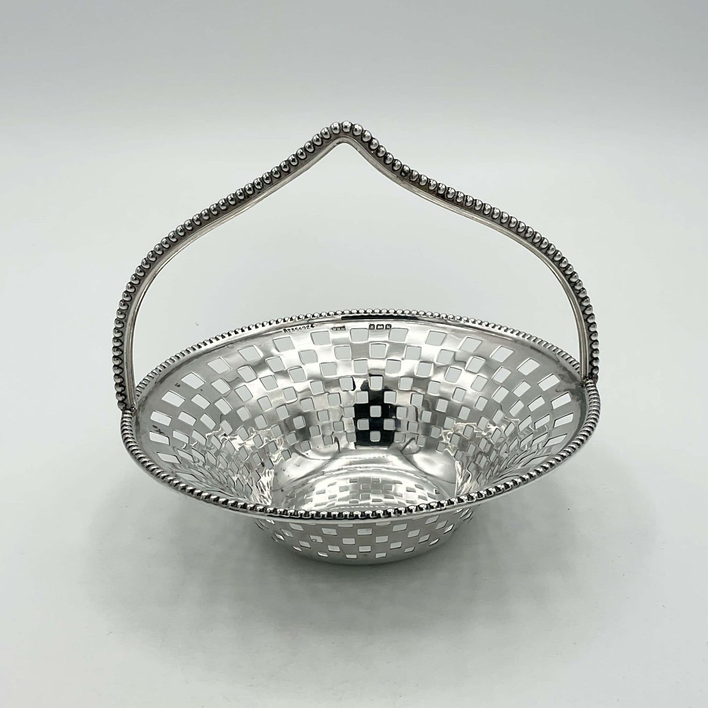 Antique Silver Basket with handle on white background